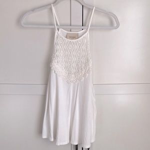 Lucy Love white strapless top with beautiful, cut out chest detail. Size small